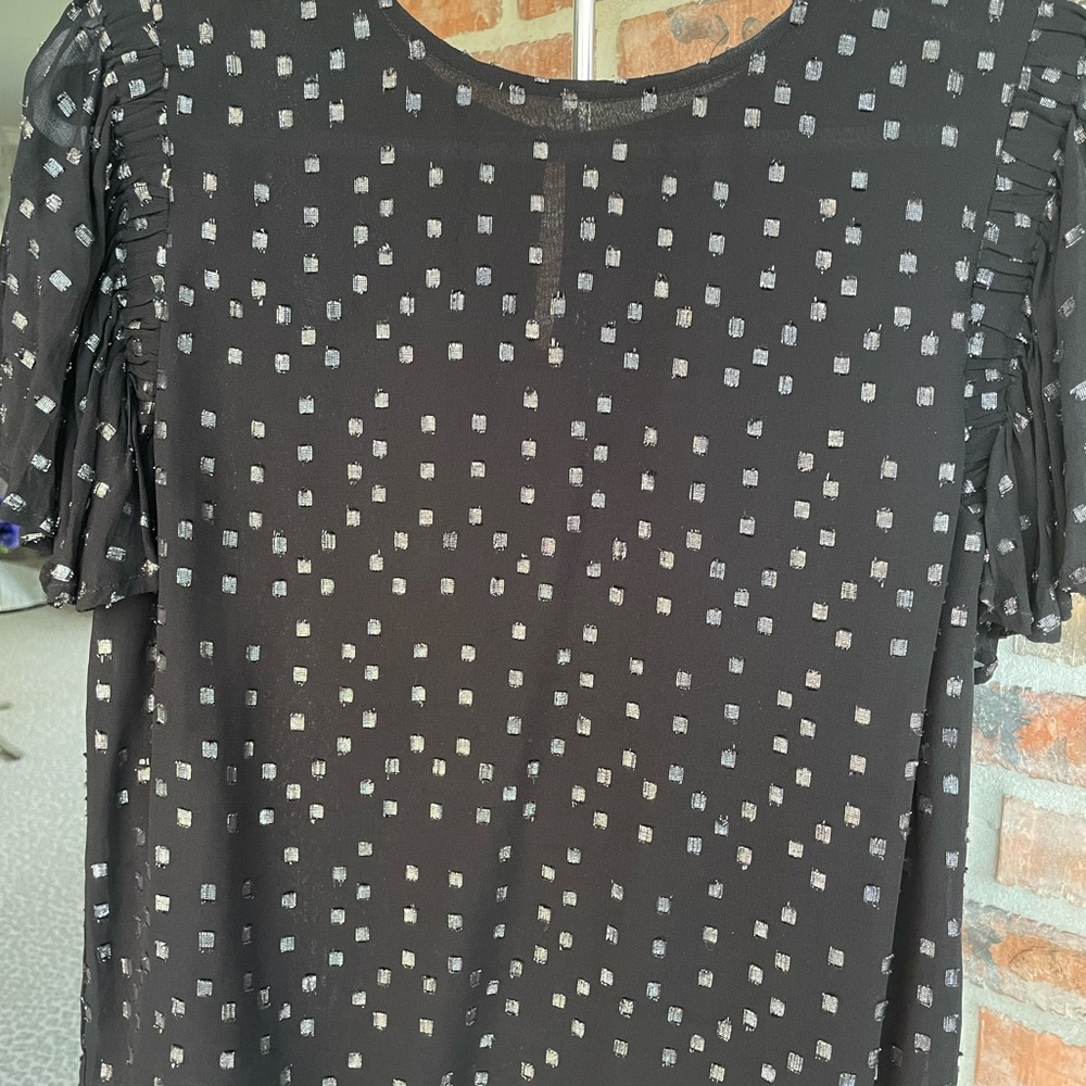 Black top with silver shimmer